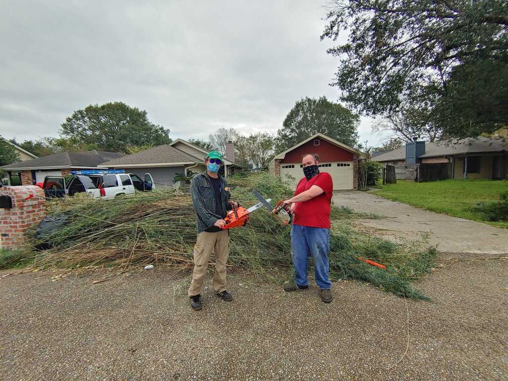 Organizers prepare to clear storm damage.