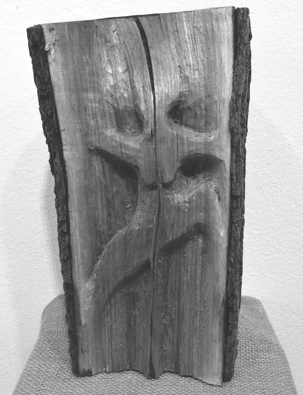 A wooden carving by Hannah Halpern.