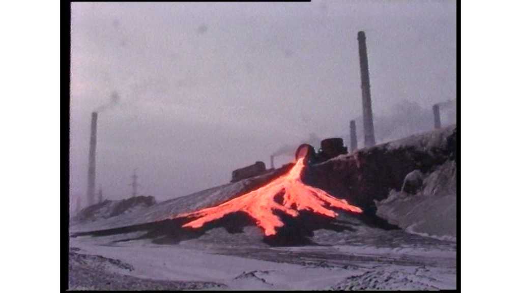 A frame from Trauma Zone showing a spill of molten iron at a factory.