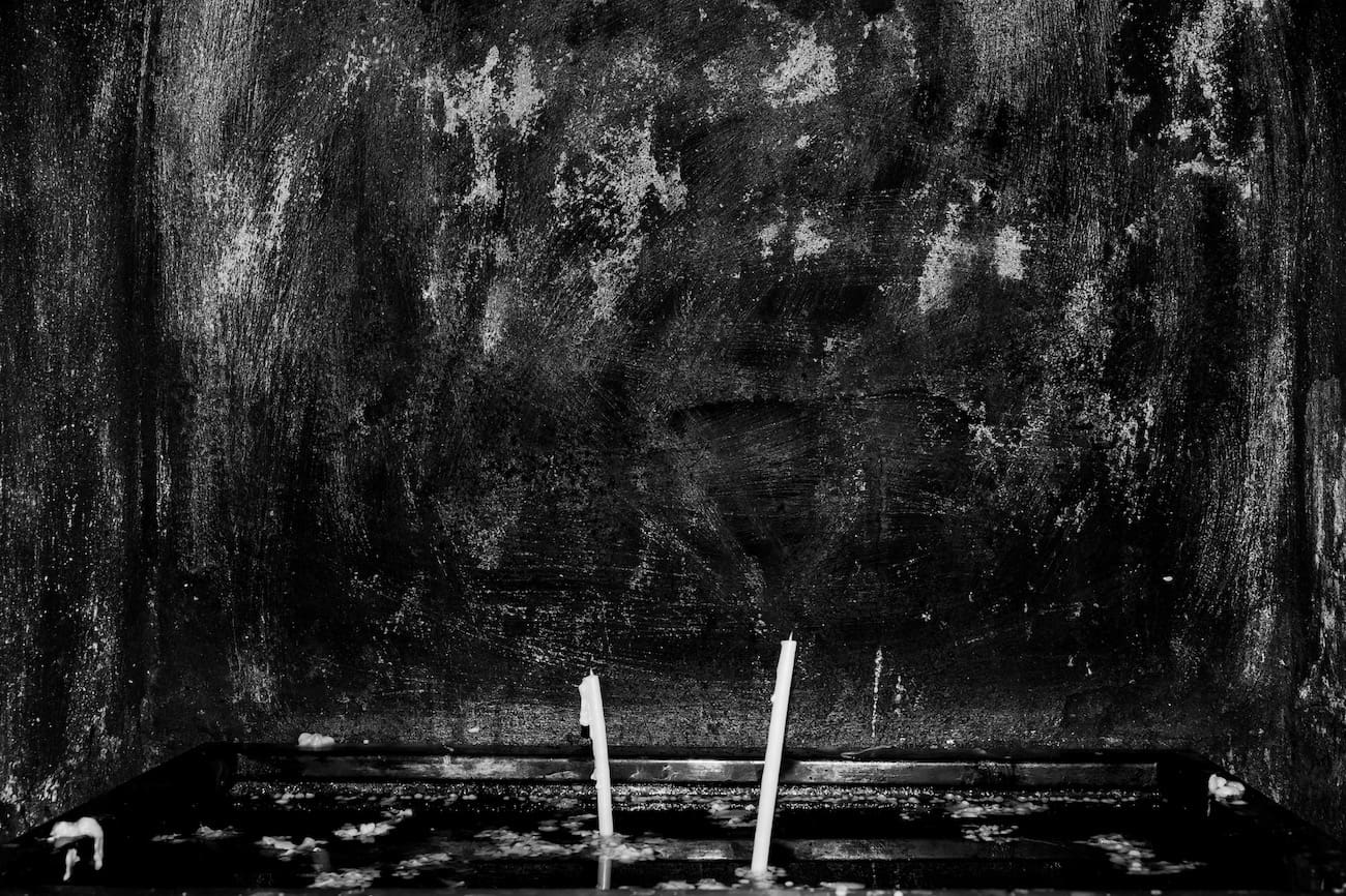 A blackboard and candles.