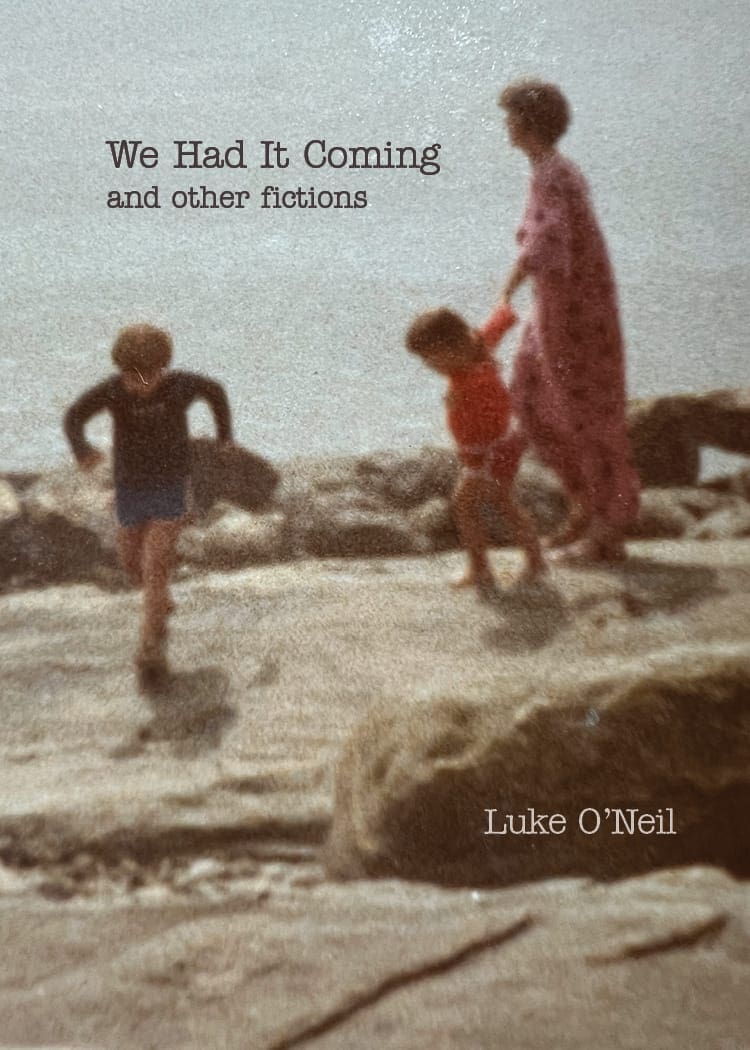 The cover of We Had it Coming by Luke O'Neil, showing a mother with two children running on a beach in a film photograph.