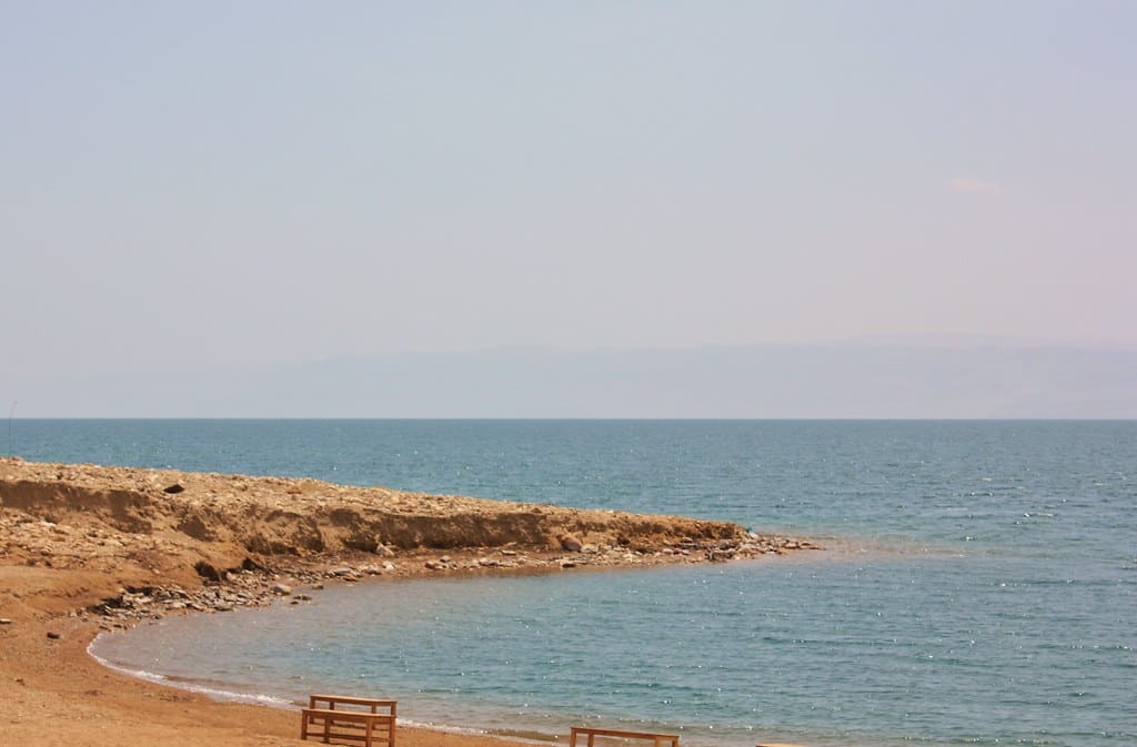 An image of the Jordan River's coast. "The Dead Sea, Jordan bank." by jemasmith is licensed under CC BY 2.0.